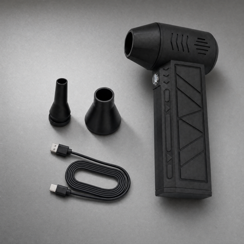 Original blower with two nozzle attachments and USB charging cable on a cool silver-grey studio surface.