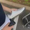 Oryn Display clears sand from a golf shoe